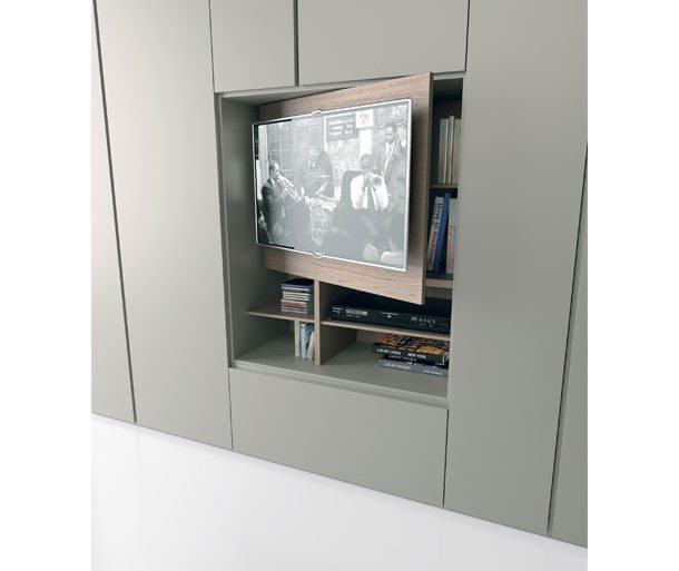 Lampia cassettiera fa da base al pannello porta-schermo che si apre su un pratico vano.