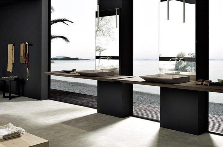 Piano in rovere ossidato, tenuto sospeso dal telaio in ferro grezzo, in abbinamento al lavabo Surf semincassato, conferisce forte personalità a un programma interamente dedicato a chi ama l’essenzialità.