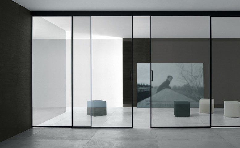 Versione in piombo spazzolato e vetro rete bronzo.