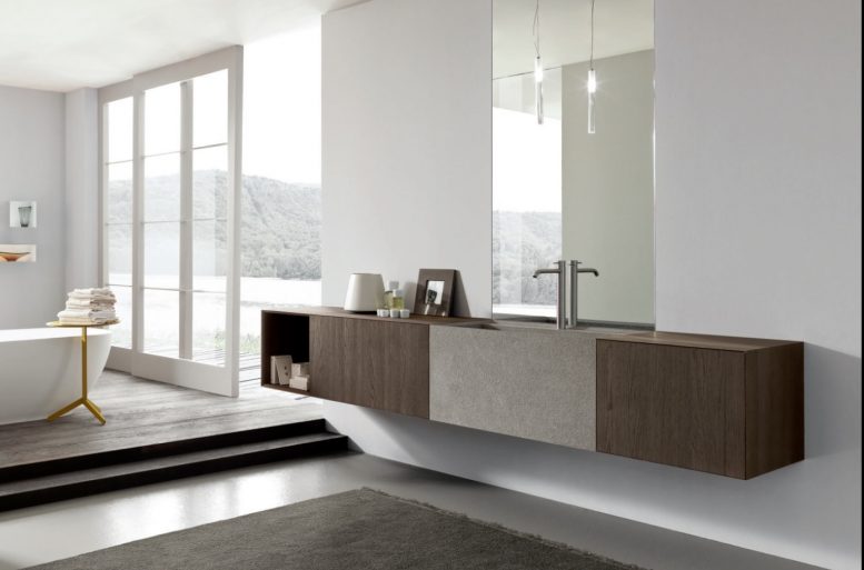 MORE
La cura nella lavorazione dei materiali viene evidenziata dalle geometrie del programma More. La lavorazione in folding delle basi in rovere ossidato segue la costruzione del lavabo in pietra piasentina realizzato con bordo a 45°. L’utilizzo di tecniche diverse a seconda del materiale, per esprimere un unico linguaggio estetico.