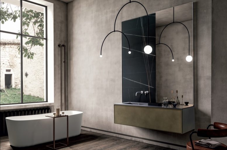 FRAME
Il bagno racconta nuovi orizzonti, descrive atmosfere intime e ricercate. Una collezione per un bagno romantico dall’inclinazione industrial: una proposta che consente di recuperare la memoria di immagini conosciute, grazie alle suggestioni suscitate da stili diversi. L’anta Frame con il suo telaio sp. 1 cm, viene proposta in questo progetto in finitura metallica bronze dust.